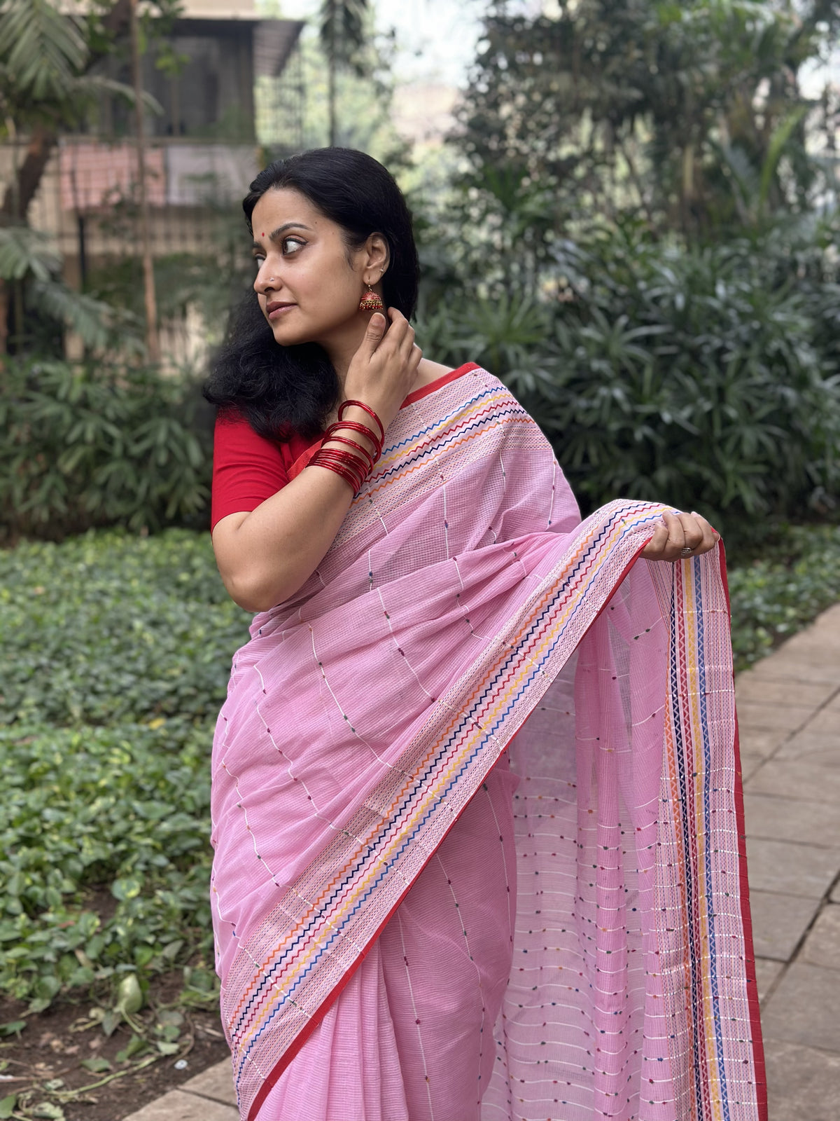Light pink khadi cotton saree with multicolour Kantha butta.