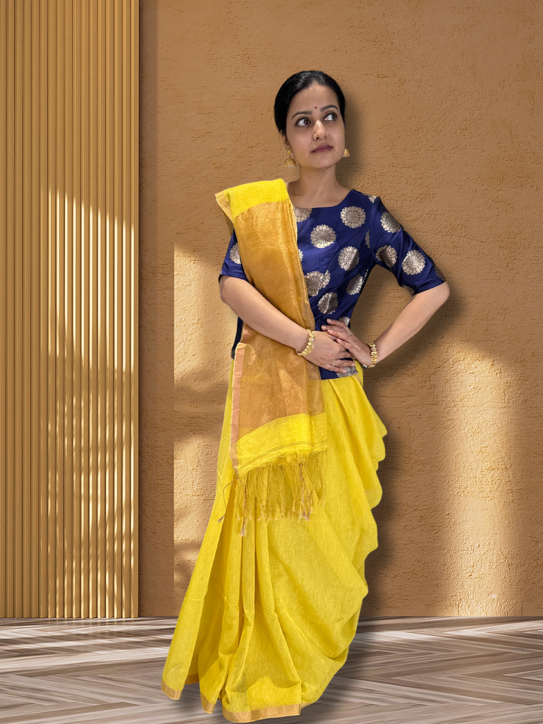 Yellow with zari detailing tissue linen handloom saree