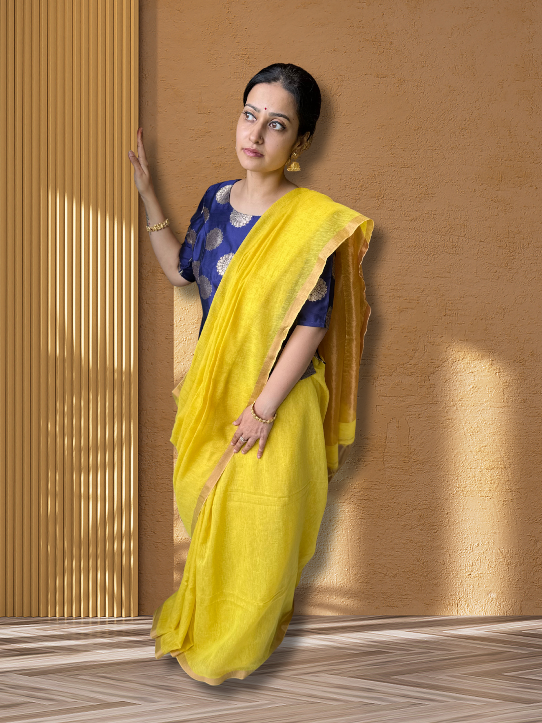Yellow with zari detailing tissue linen handloom saree