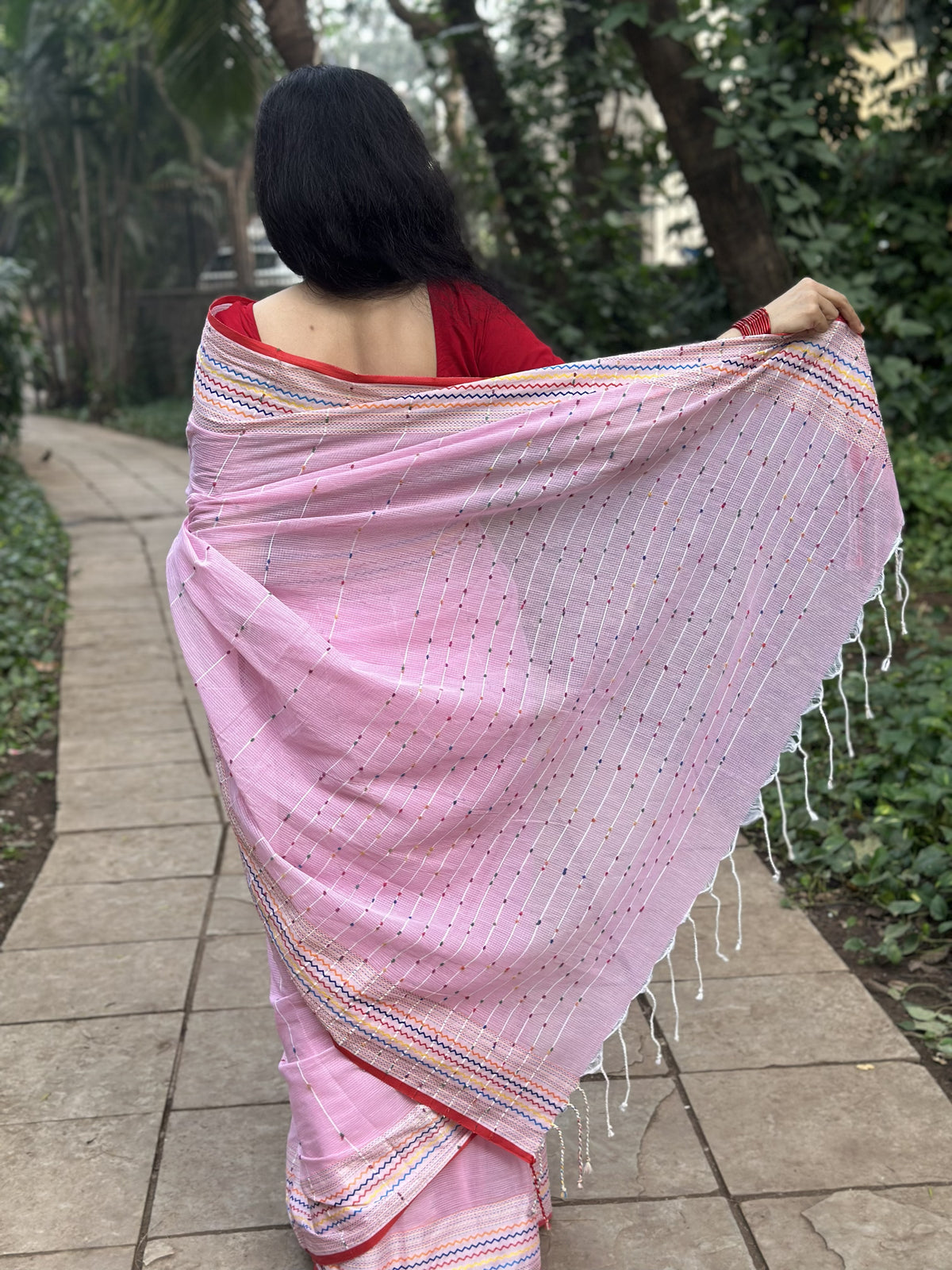 Light pink khadi cotton saree with multicolour Kantha butta.