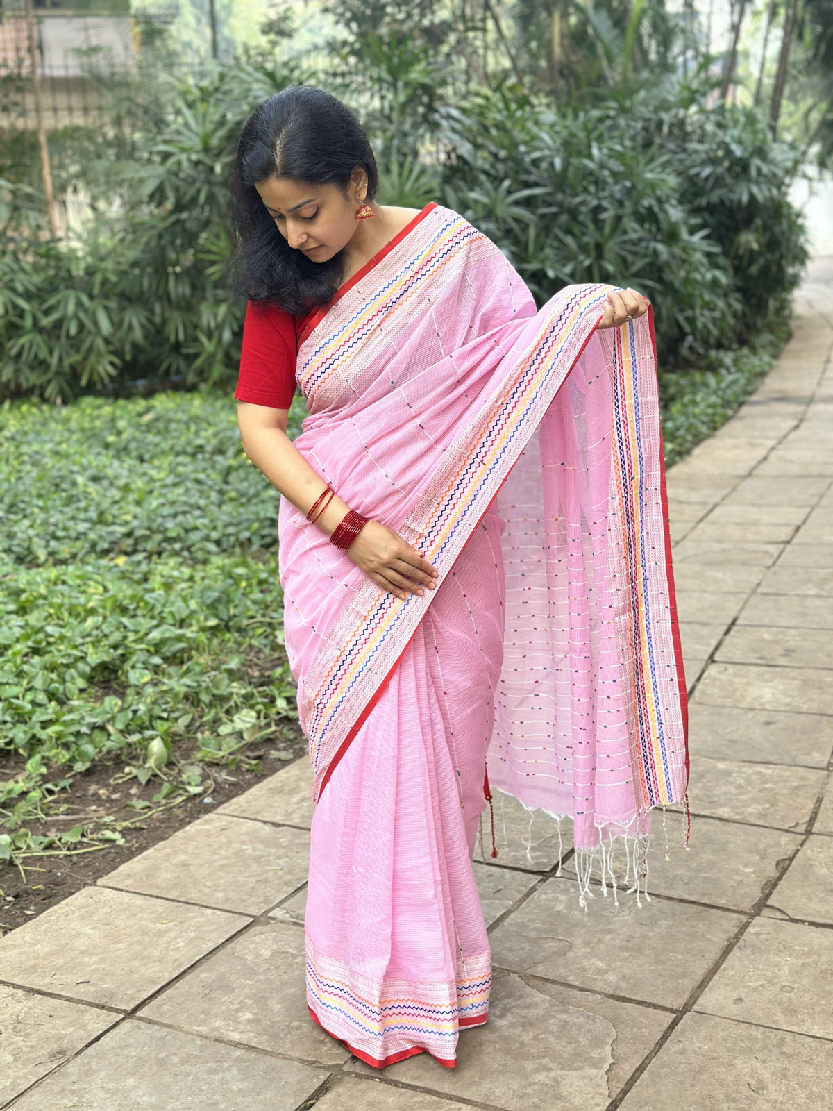 Light pink khadi cotton saree with multicolour Kantha butta.
