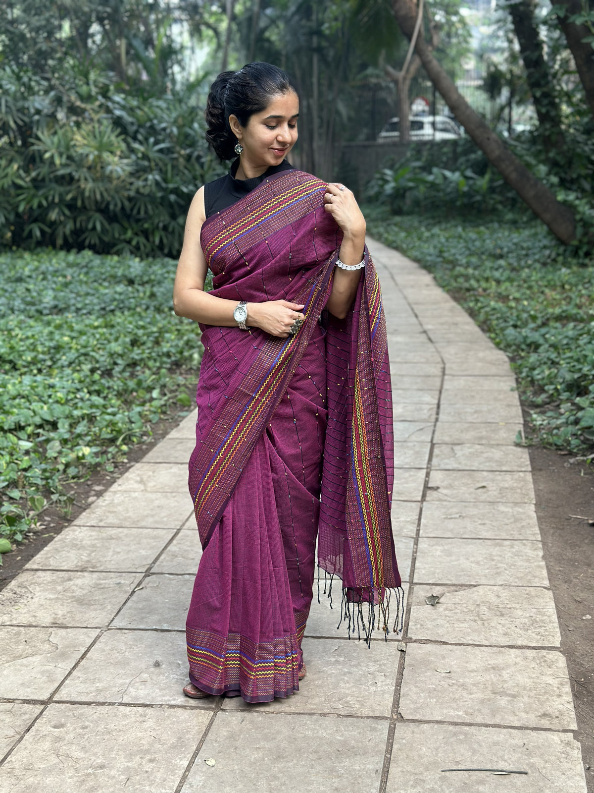 Dark purple khadi cotton saree with multicolour Kantha butta.