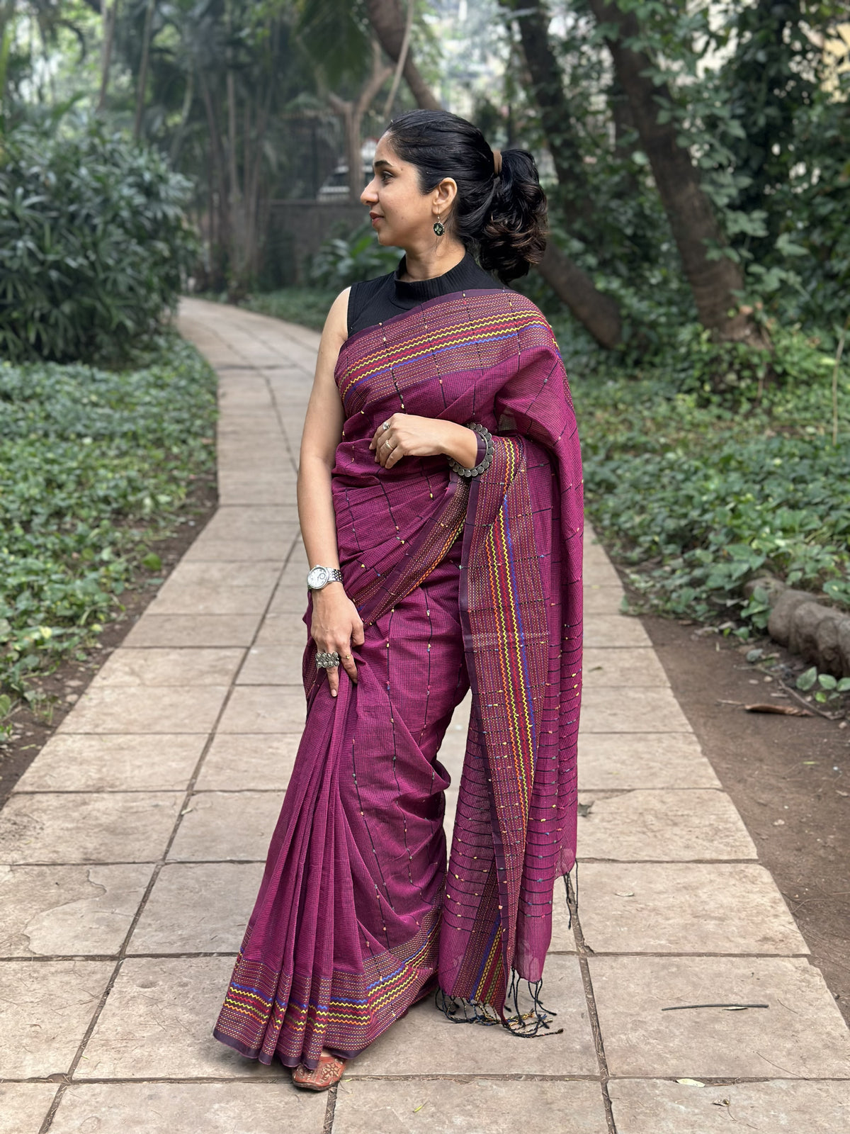 Dark purple khadi cotton saree with multicolour Kantha butta.