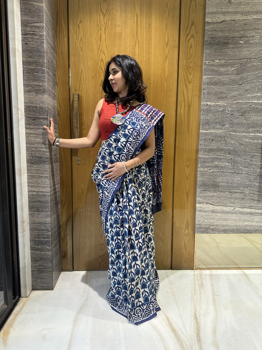 Indigo mul cotton saree with white floral handblock Bagru print.