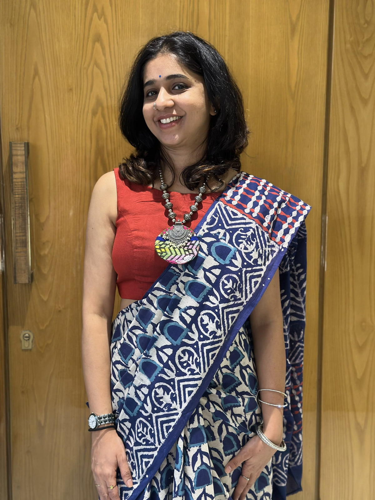 Indigo mul cotton saree with white floral handblock Bagru print.