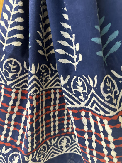 Indigo mul cotton saree with white floral handblock Bagru print.