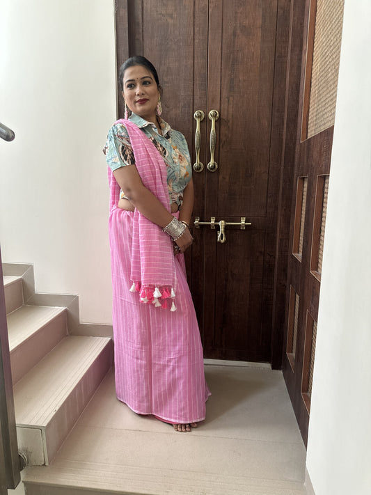 Light pink mul cotton saree with subtle white stripes.