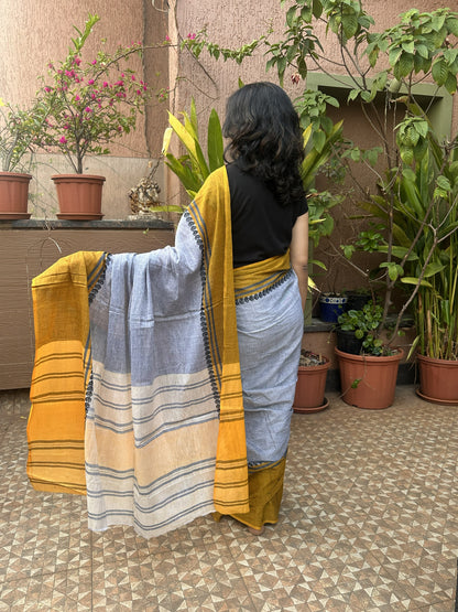 Grey Dhonekhali cotton saree with yellow border