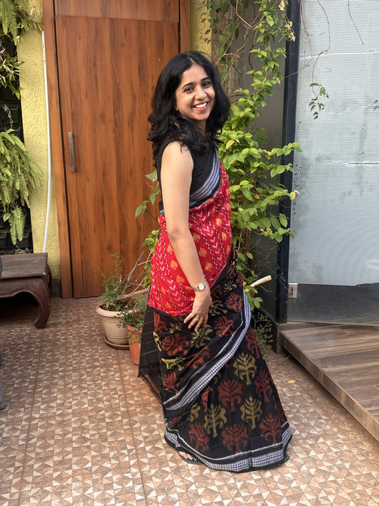 Red and black Sambalpuri cotton saree with double ikkat weave.