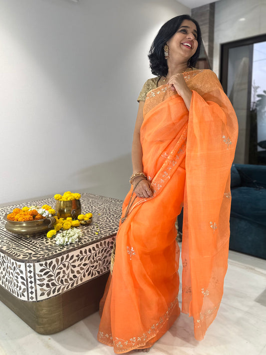 Beige Kota silk saree with golden pita work