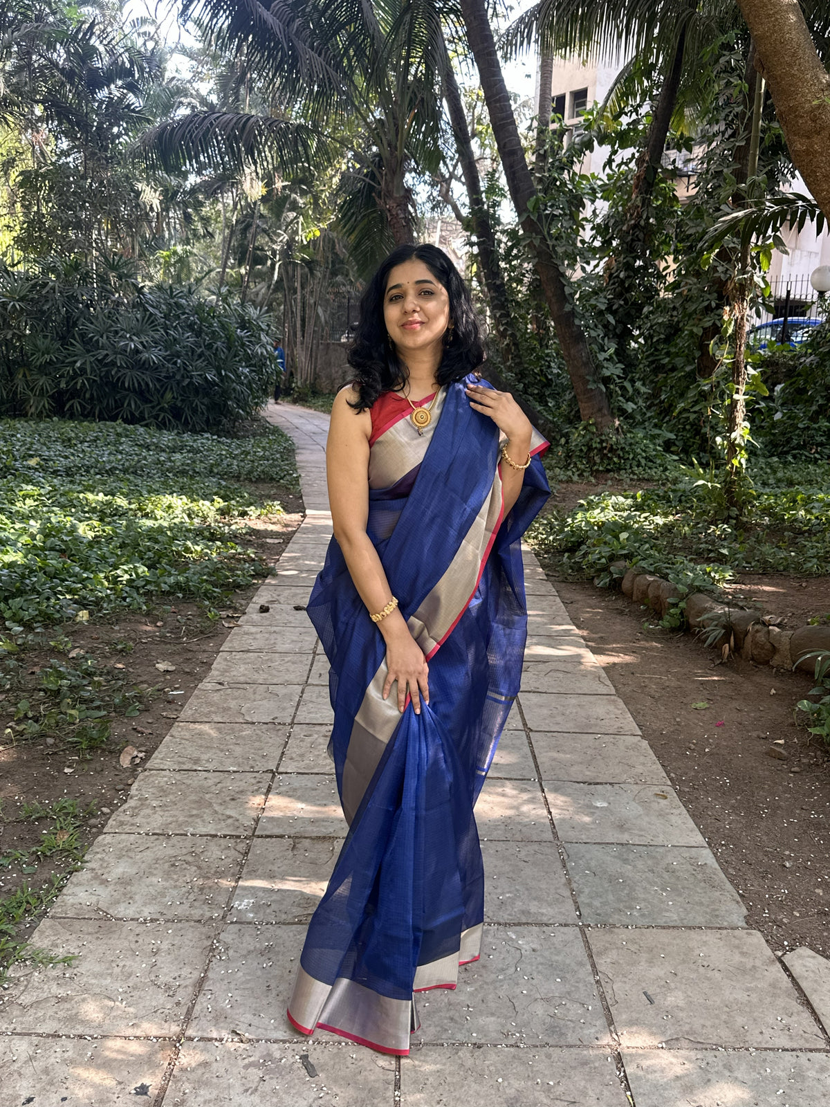Dark blue Kota Doria silk saree with silver and red border
