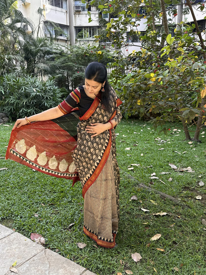Black and beige Maheshwari cotton silk saree with red pallu