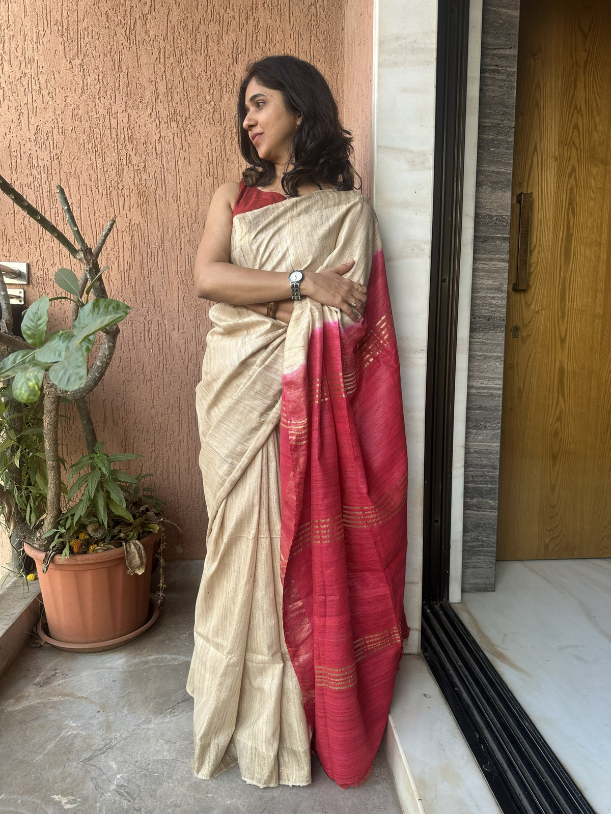 Off-white tussar Ghicha saree with zari border and maroon pallu