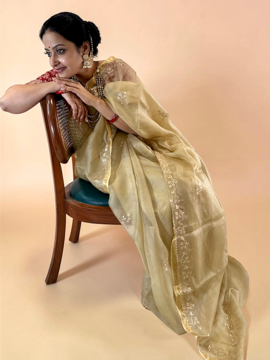 Beige Kota silk saree with golden pita work